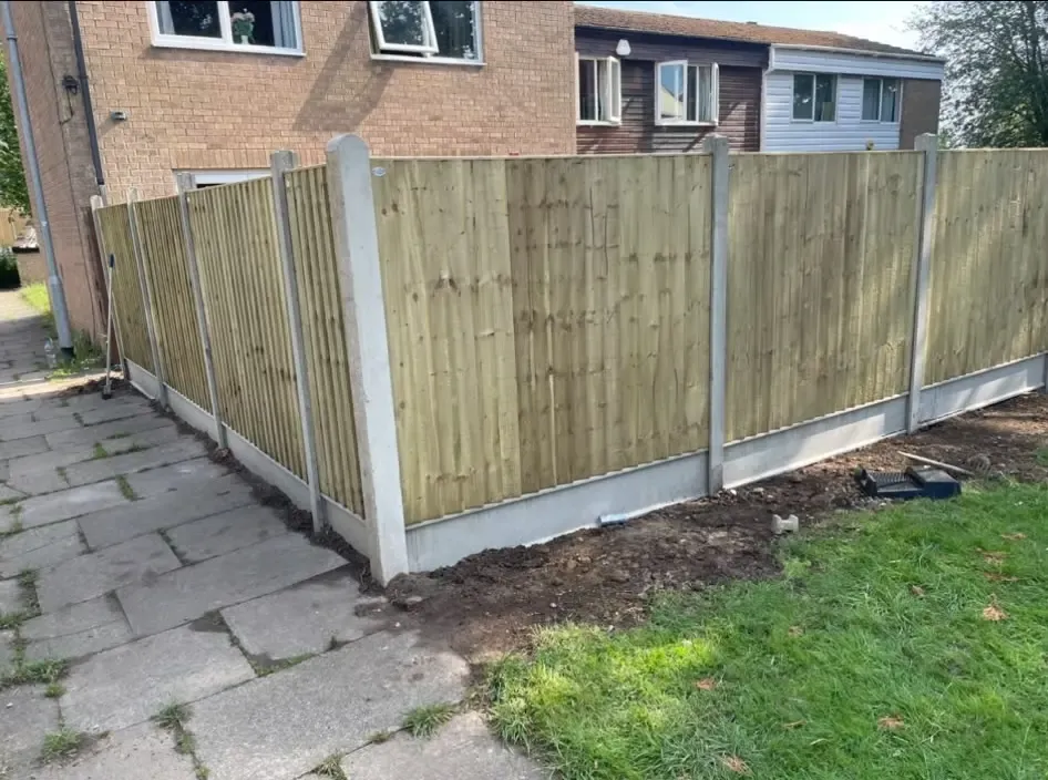 Professional closeboard garden fencing installation with concrete posts in Northampton